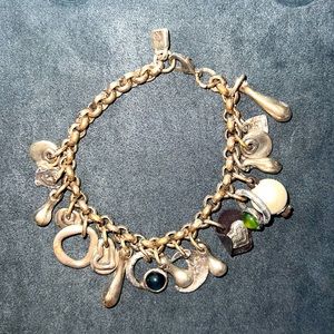 Uno de 50  Sterling Silver charm bracelet - One Size - good condition